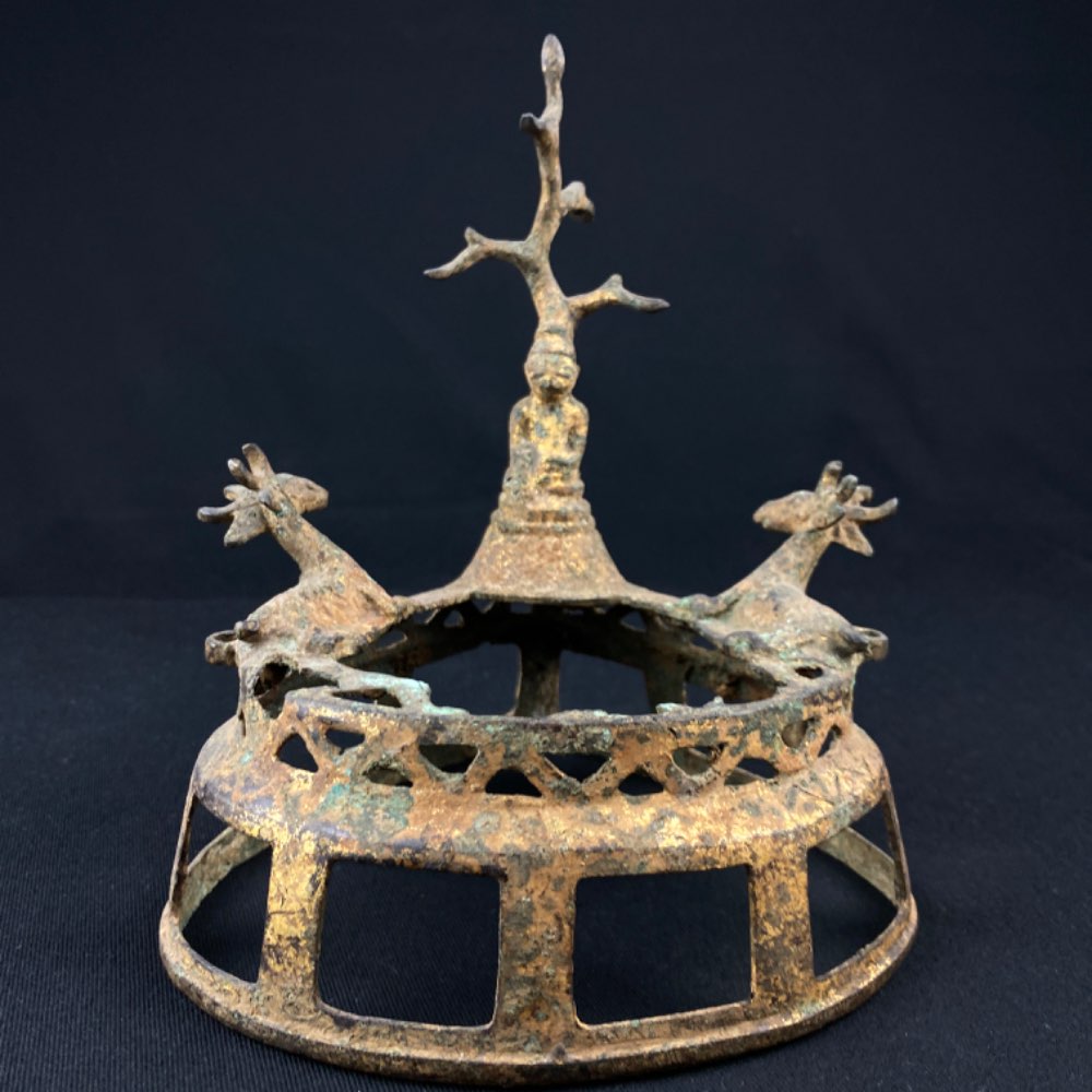 A bronze Pagan altar Buddha with a tree on top and 2 deer, 17th century from Myanmar