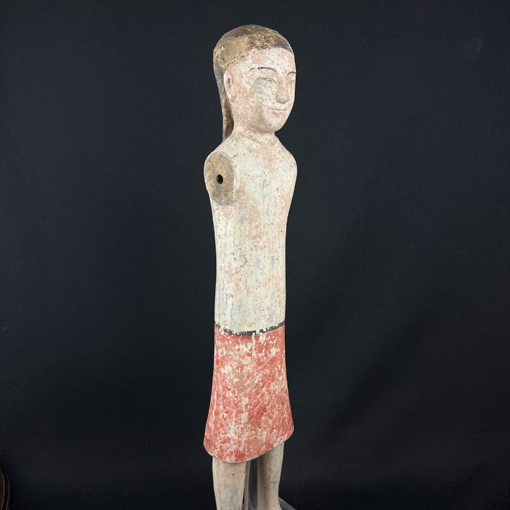 A pottery stick lady from the han dynasty (206 BC-220 AD), TL tested