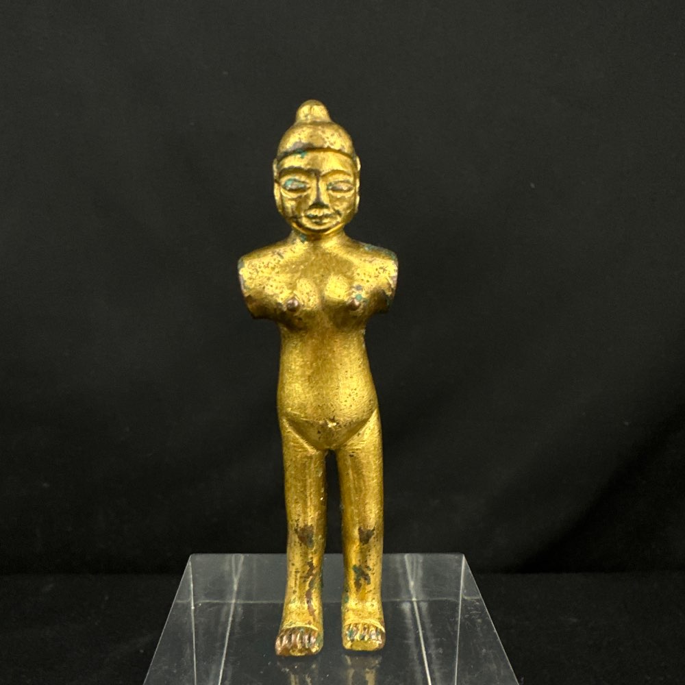 A rare small gilded bronze figure of a women from the han dynasty (206 BC-220 AD)