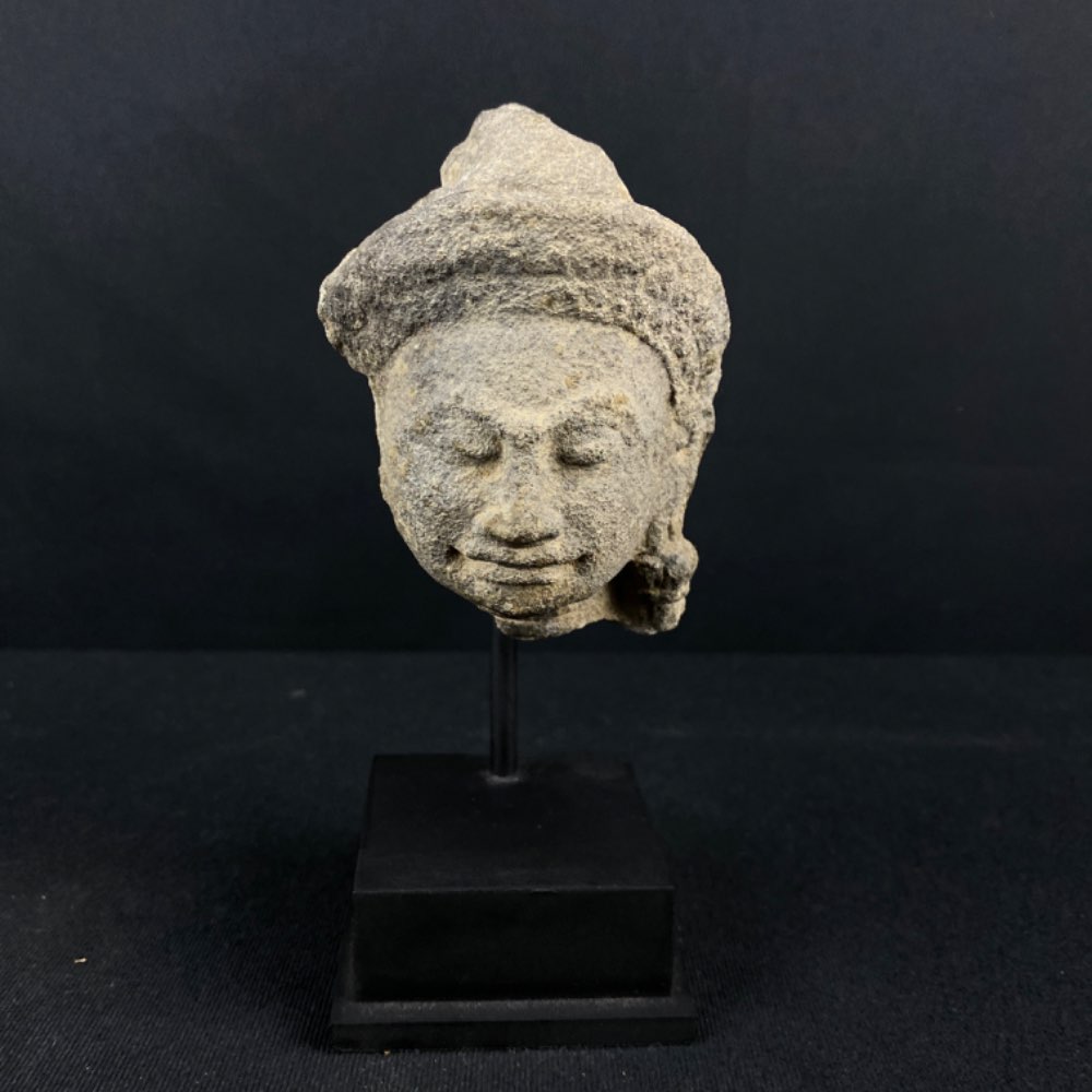 A sandstone head of Vishnu from Angkor Wat Cambodia, 12th century