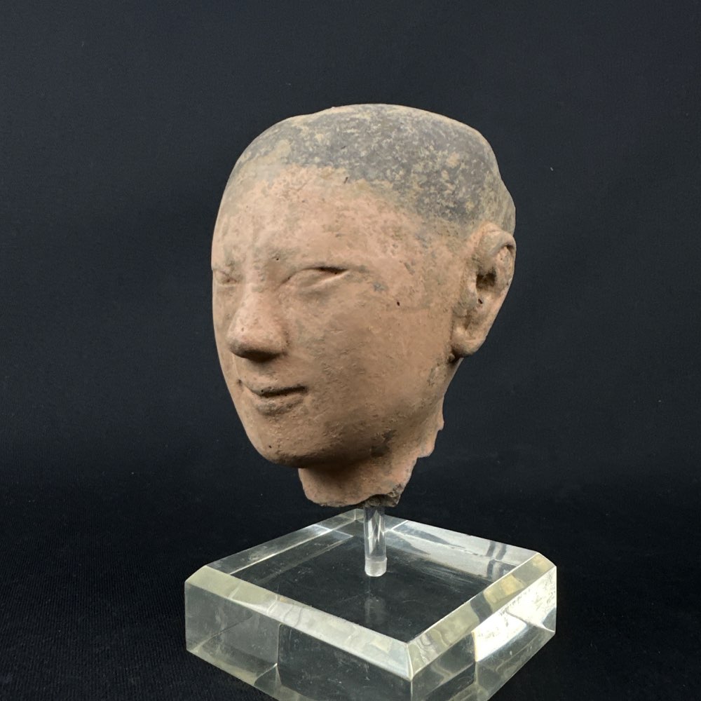 Pottery stick figure head from the han dynasty (206 BC-220 AD)