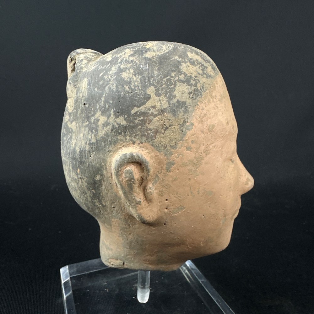 Pottery stick figure head from the han dynasty (206 BC-220 AD)