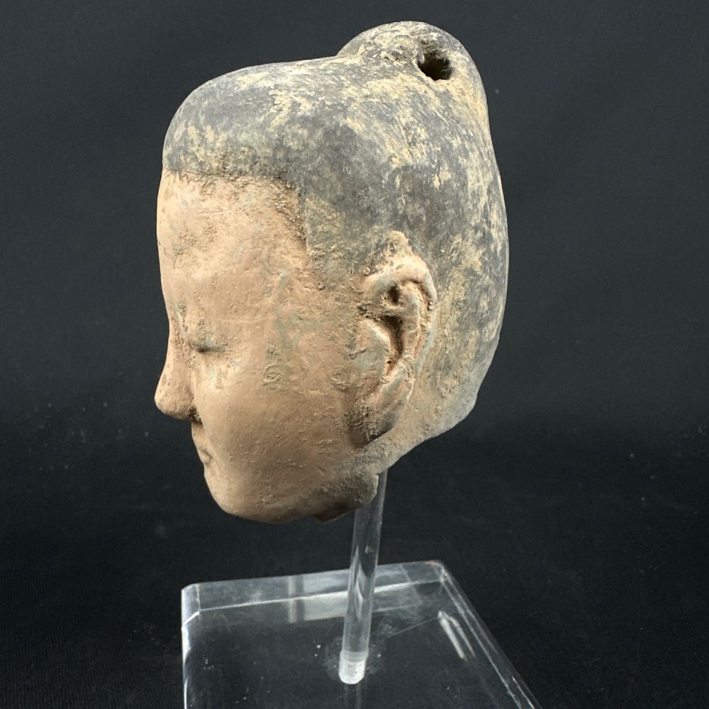 Pottery stick figure head from the han dynasty (206 BC-220 AD)